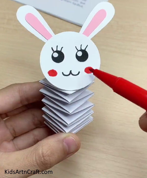 Making The Bunny's Face - Children Can Have Fun Crafting A Bouncing Paper Rabbit At Home