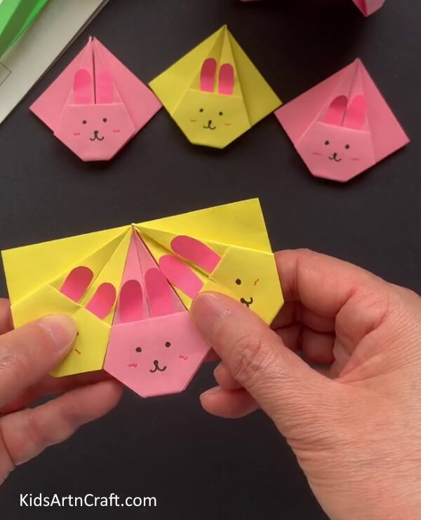 Inserting Yellow Bunny Into Pink How to Make a Bunny Face Paper Parasol - A Simple Tutorial