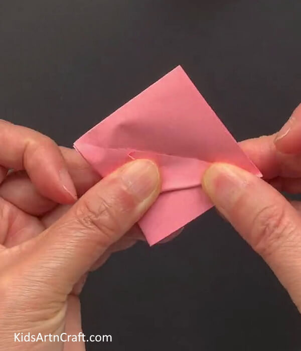 Folding The Left Side of 'T' Follow this Guide to Make a Bunny Face on a Paper Umbrella