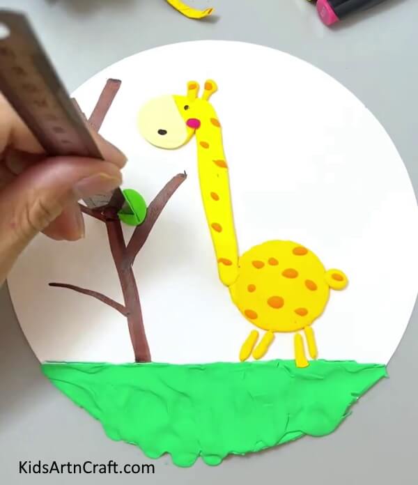 Making A Vein On The Leaf - Learn to Make a Clay Giraffe Yourself - A Step-By-Step Guide For Kids