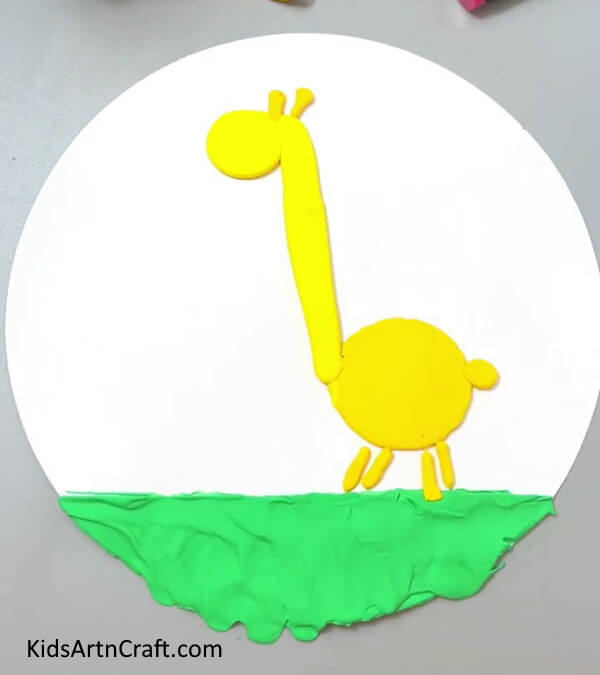 Making Ears And Tails Of The Giraffe - Teach children how to construct a Clay Giraffe with this DIY tutorial