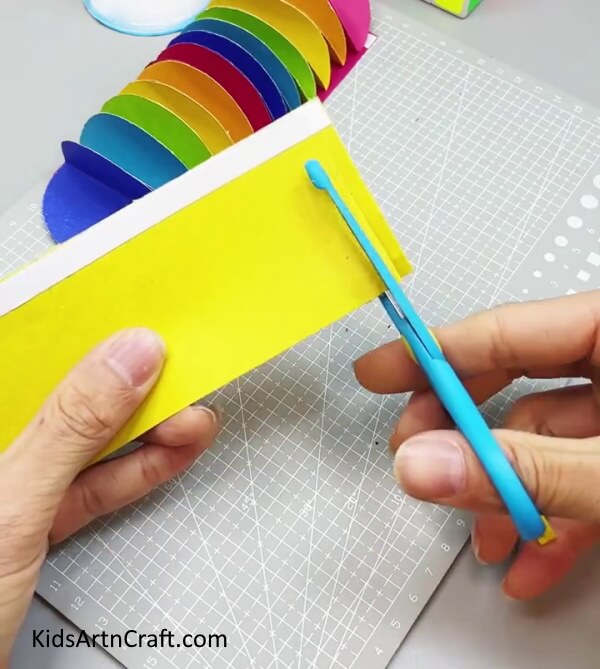 Making Thin Strips Of A Yellow Paper - Guide on Decorating with Colorful Paper Lanterns