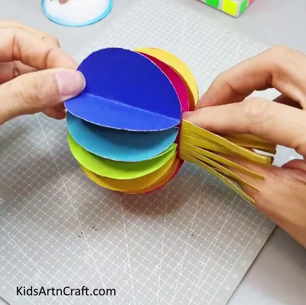 Roll Over The Sheet To Form A Lantern - Home Decor with Colorful Paper Lanterns - Tutorial