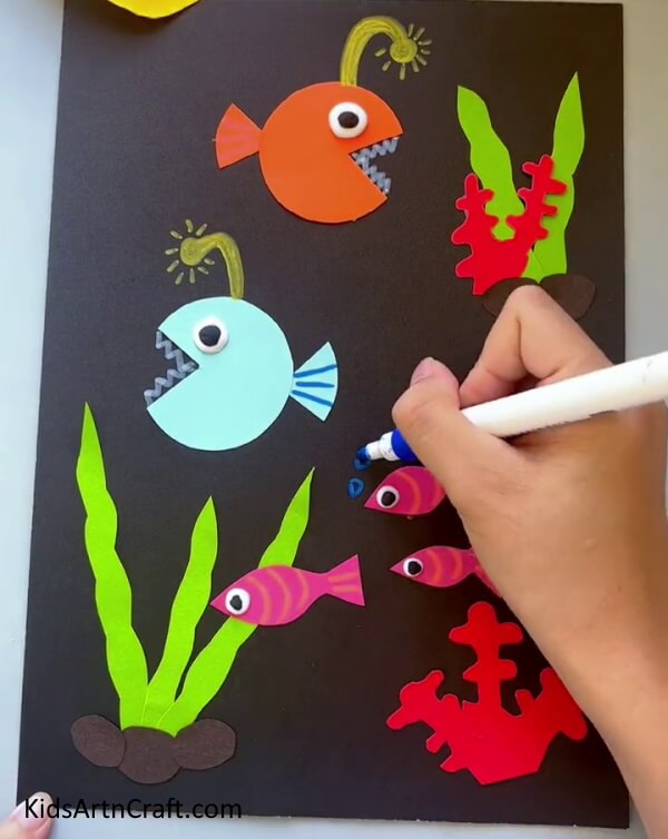 Making Bubbles Doing a Fish Tank with Craft Paper for the young ones