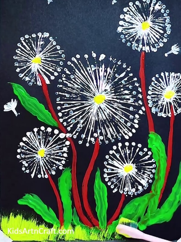 Making grasses with the toothbrush- A Fun and Creative Painting Idea for Kids Using Dandelions