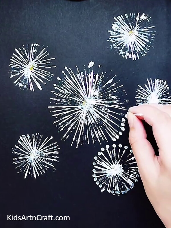 Take cotton bud dipped in white paint- Kids' Creative Fun with Dandelion Flower Paintings