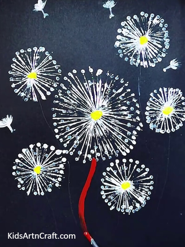 Making stem with red colour paint- A Fun and Creative Painting Idea for Kids Using Dandelions