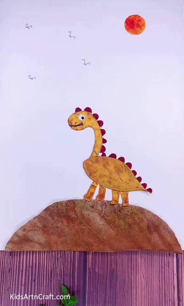 Drawing Birds on White Sheet to highlight the dinasour- Put together a dinosaur from leaves with this easy craft tutorial for kids.