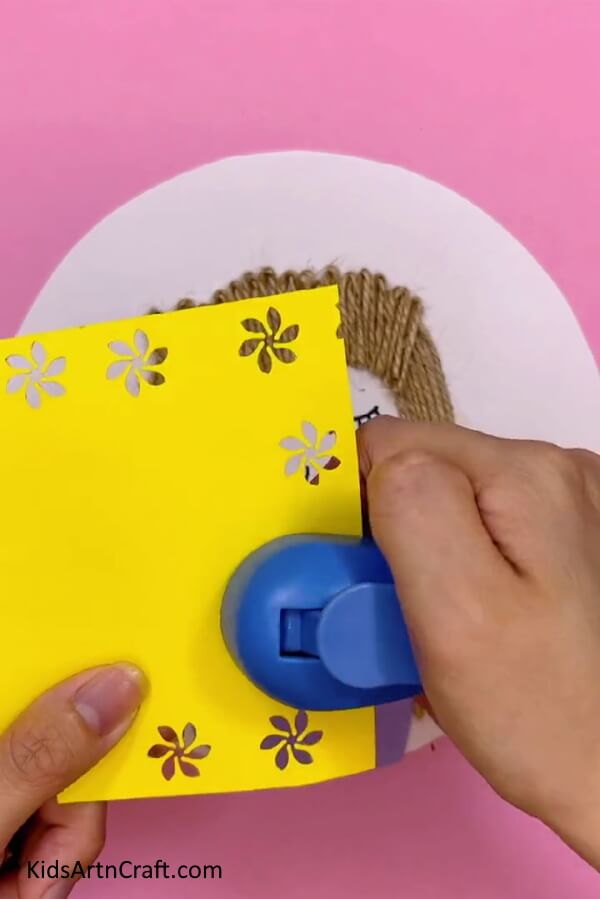 Cutting Paper Flowers - This tutorial will help you build a doll your own for kids.