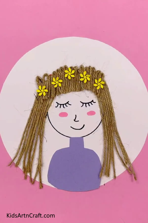 Pasting The Paper Flowers - Make your own doll with this step-by-step guide for kids.