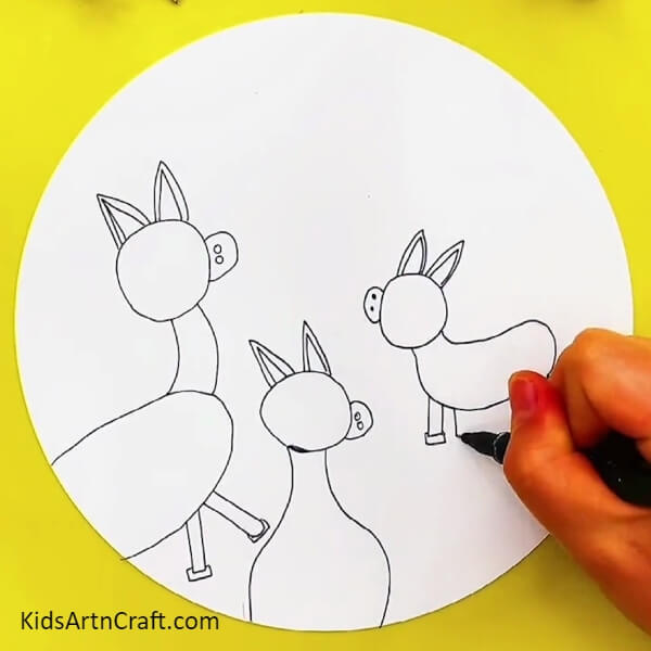 Take a pencil and draw a donkey with it. Outline the donkey with a black marker- Self-made Donkey Painting Art Step-by-Step Guide For Children