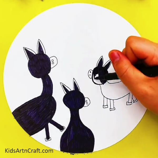 Colour the donkeys with a black marker- How to Make a Donkey Painting Art Project For Kids