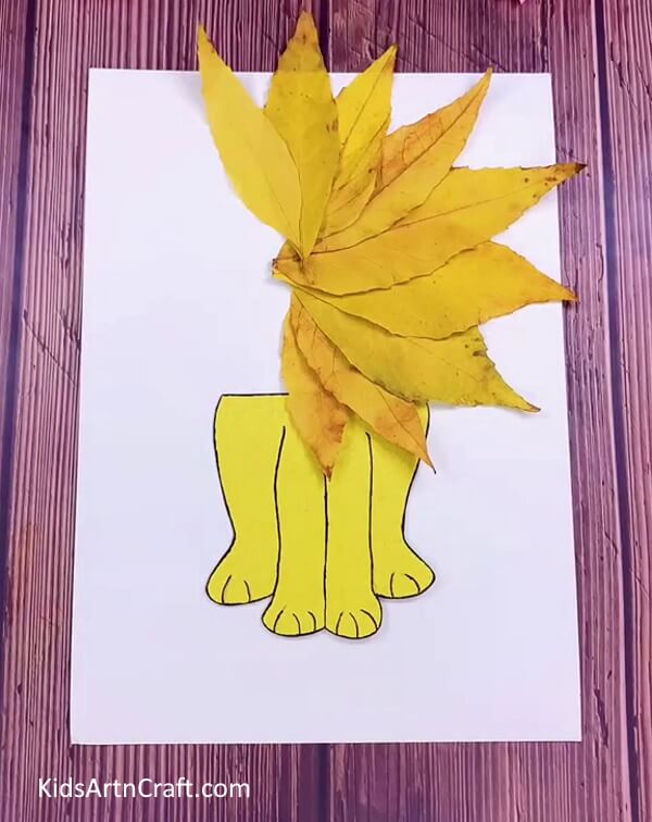 Pasting More Leaves In A Circular Manner-Manufacture a Lion Craft In No Time Employing Fall Leaves At Your House