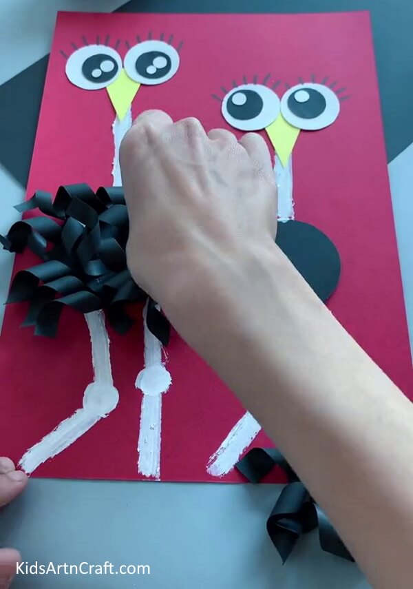 Adding Feathers-Tutorial for making an Ostrich Craft with ease for young ones. 