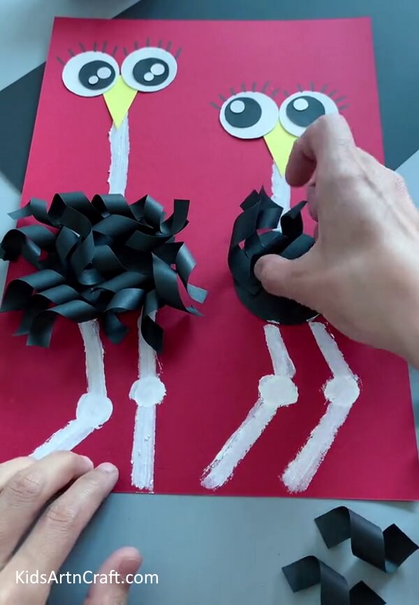 Doing The Same On The Other Ostrich.- DIY instructions for a kid-friendly Ostrich Craft. 