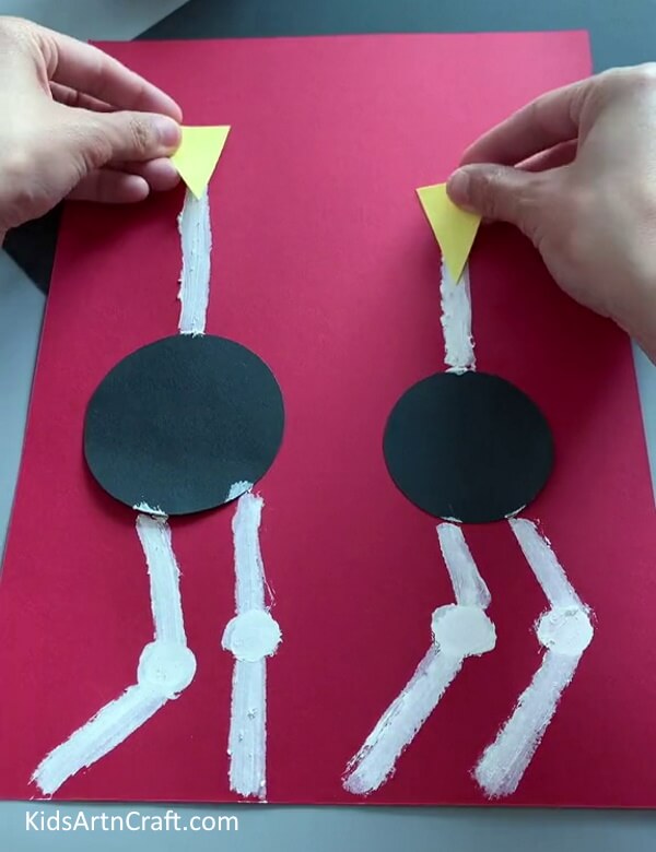 Pasting The Beaks - How to Do an Ostrich Craft with Little Difficulty for Children