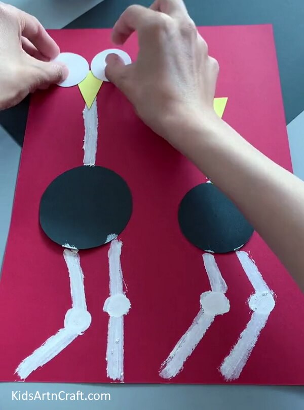 Pasting The Eyes- Step-by-Step Guide for Kids to Do an Ostrich Craft