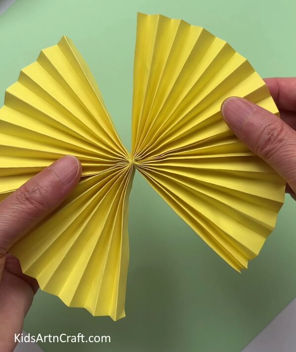 Making One More Strip - Make a straightforward paper bee craft with your kids.