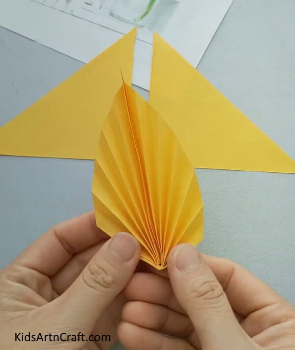 After Sticking It Will Give You Leaf Like Shape Craft Tutorial For Kids- A walk-through on constructing a paper fish craft for kids. 