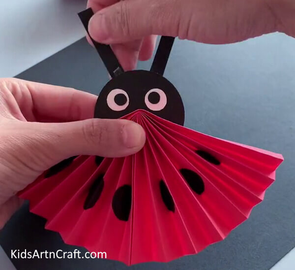 Add the antennae to looking cute Ladybug Craft