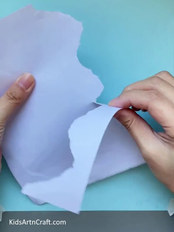 Working With The Colored Sheets-Construction of a paper penguin craft for preschoolers is simple