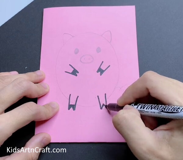 Overdrawing Over Pencil With Marker-An easy tutorial on how to make a paper pig craft with kids
