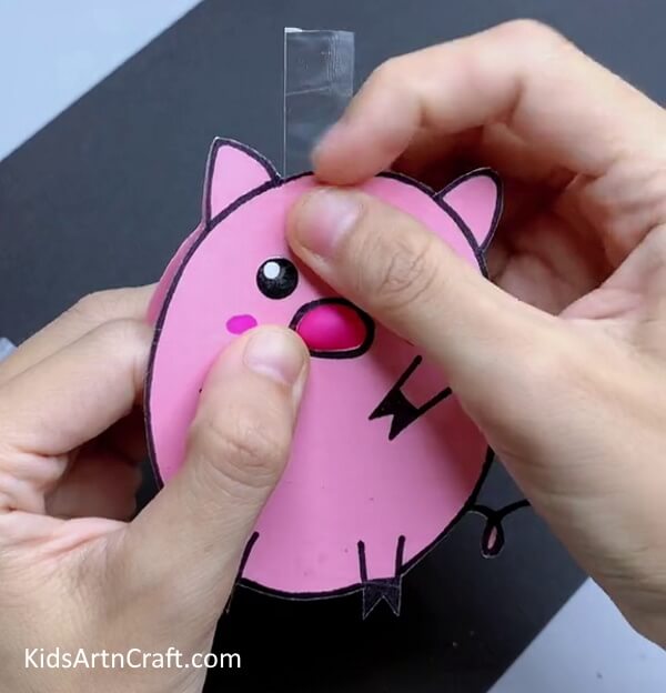 Joining The Two Shapes Together-How to put together a paper pig craft for kids