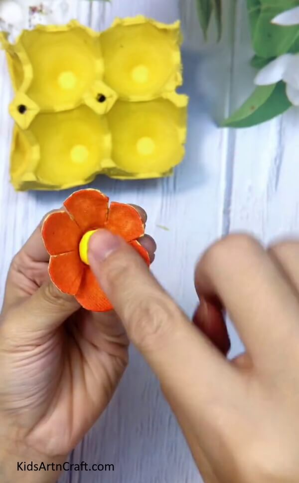 Making The Center Of The Flower - Making a flower with a reused egg carton in the home.