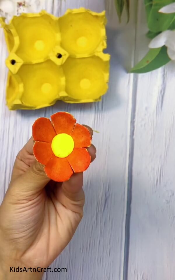 Pressing The Clay Ball - Crafting a flower from a recycled egg carton in the comfort of your own home. 