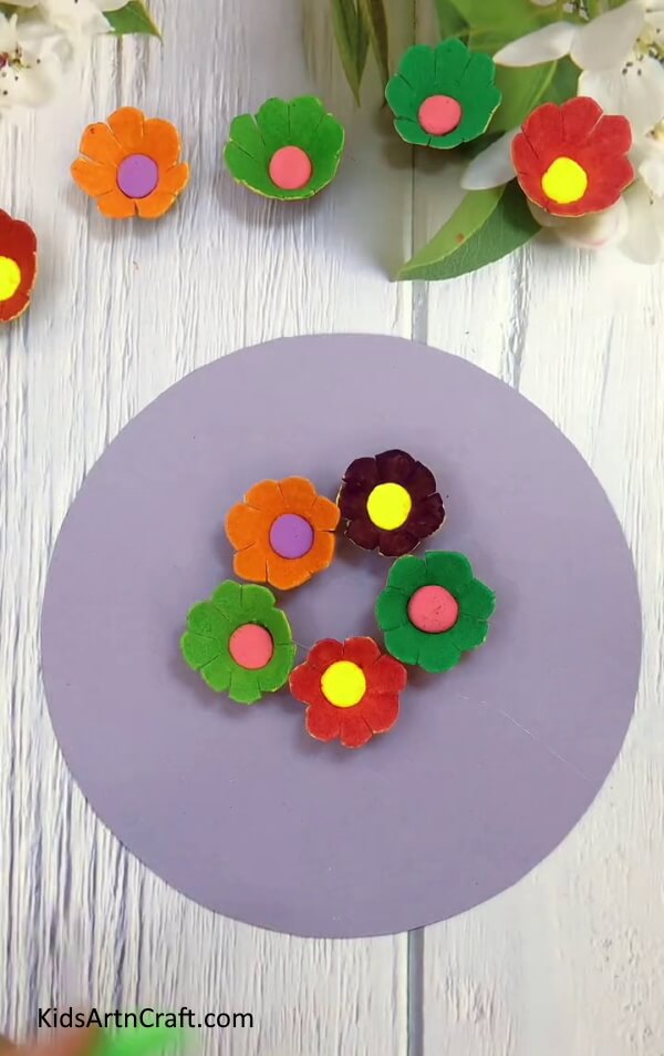 Pasting More Flowers - Make a flower with an upcycled egg carton in your house. 