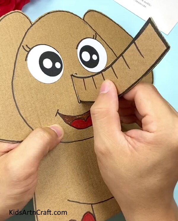Inserting Trunk In Rectangle Nose-Building an Elephant Out of Cardboard for Kindergarteners