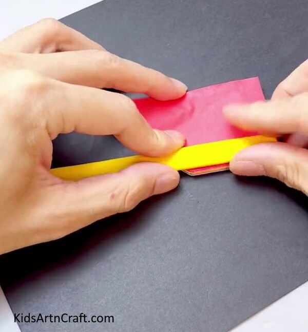 Pasting Paper Strip - Constructing a Hand Fan with Colorful Paper for the Younger Ones 