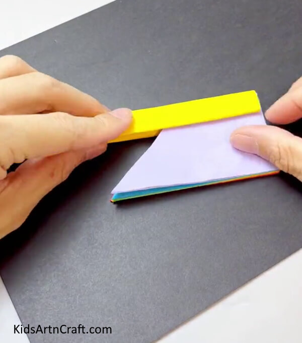 Pasting Another Paper Strip - Assembling a Hand Fan with Colorful Paper for Kids 