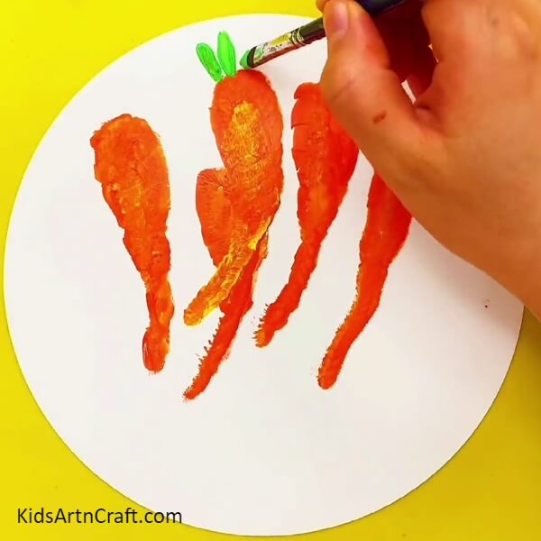 Making Carrot Stems - An entertaining painting project for the kids: a handprint shaped carrot in a basket.