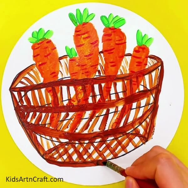 Completing Detailing The Basket - Crafting a handprint carrot in a basket painting with the kids.