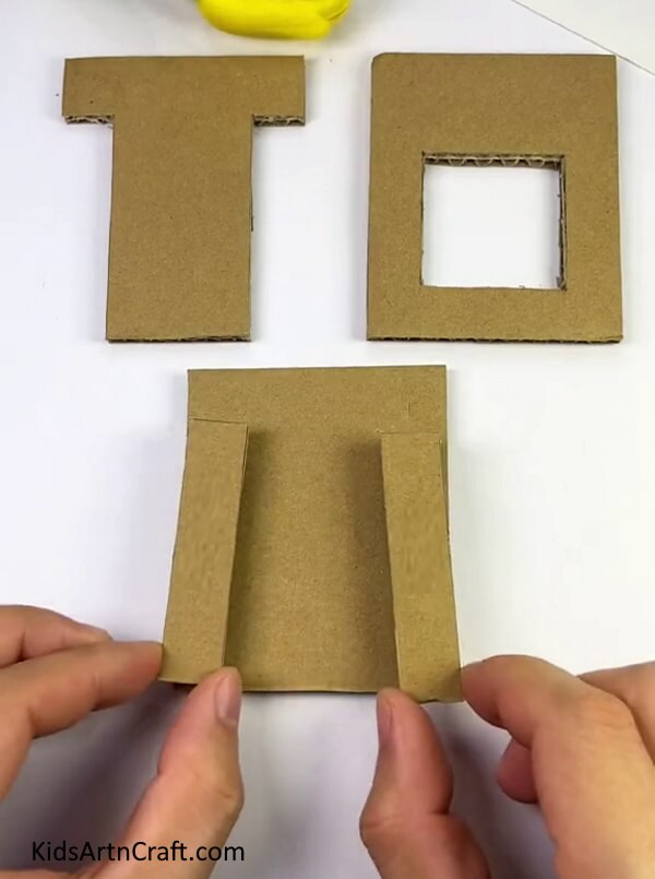Pasting Cardboard On Square Sides-Instructions for Building a Heart Shooter for Kids