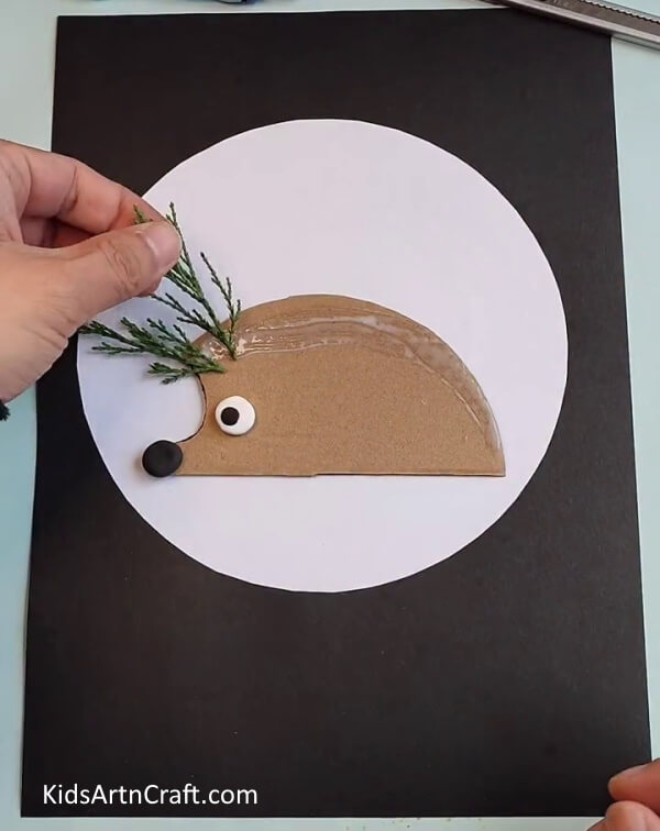 Pasting Pine Leaf on the Cardboard-Learn How to Create a Hedgehog out of Leaves - Fun for Kids!