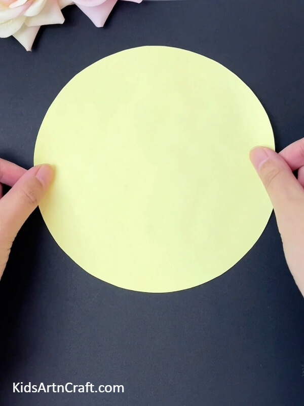 Cutting A Yellow Circle -1. Making a Lion Visage Artwork Utilizing Orange Peels