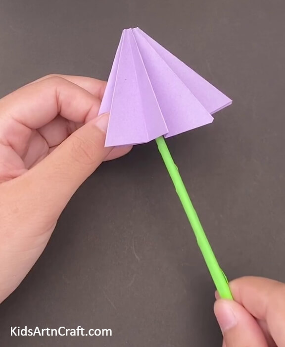 Inserting The Handle Of The Umbrella- A Tutorial for Constructing an Origami Cocktail Umbrella for the Rookie