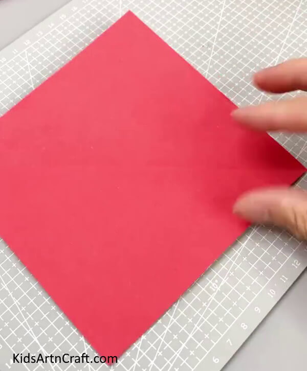 Getting A Red Square Paper - Crafting Origami Claws From Paper - A Guide For Children 