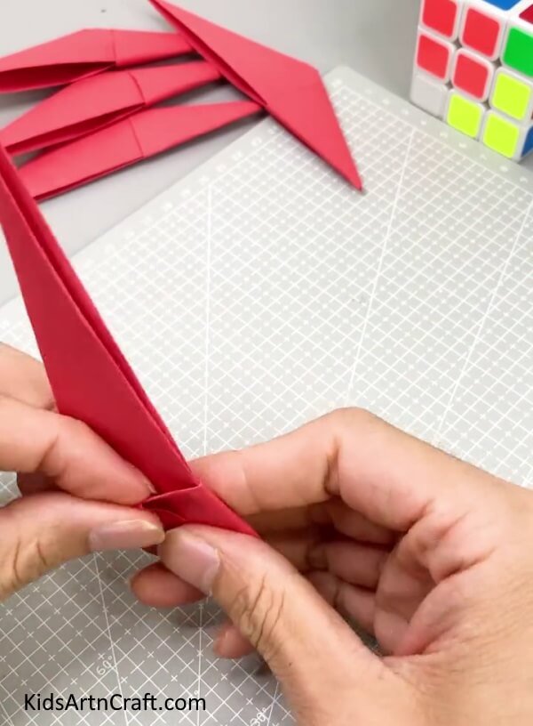 Inserting Into The Pocket - Create Origami Claws Using Paper - An Easy Guide For Kids 