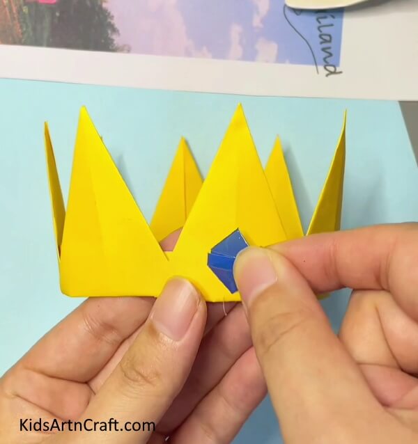 Give it some details with glitter craft paper- A Fun Tutorial to Help Kids Make an Origami Paper Crown