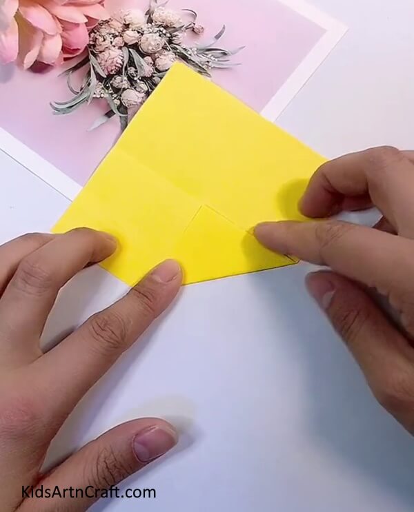 Folding The Corner To The Crease-Crafting Origami Blossoms Using Paper - A Fun Project for Children 