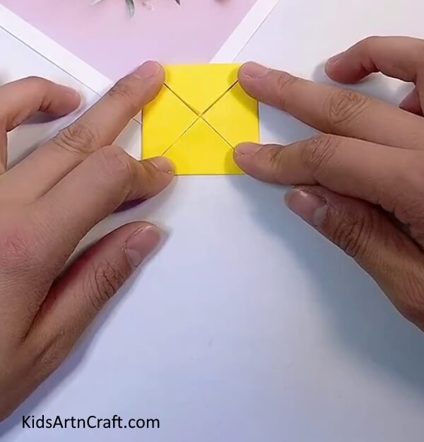 Folding The Other Corners To The Diagonal- Designing Origami Blossoms Using Paper - An Engaging Project for Little Ones 