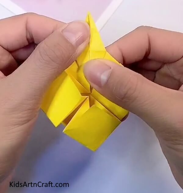 Folding The Other Side Of The Diamond-Crafting a Paper Origami Blossom - An Enjoyable Activity for the Little Ones
