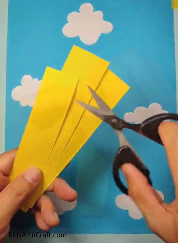 Cutting Out Yellow Strips-Learn How to Make a Paper Bee with This Tutorial