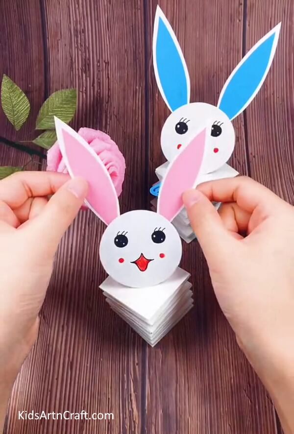 Sticking The Ears Of The Bunny-Do-It-Yourself Paper Bunny for Easter Decor