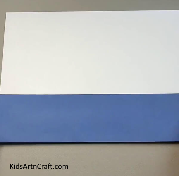 Pasting Long Rectangle To Make a Road- Learn how to make a paper car landscape for children with this tutorial.