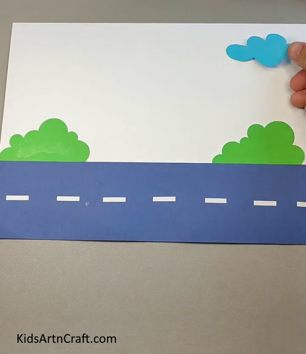 Pasting Clouds On Sky-A kid-friendly guide to drawing a paper car landscape. 