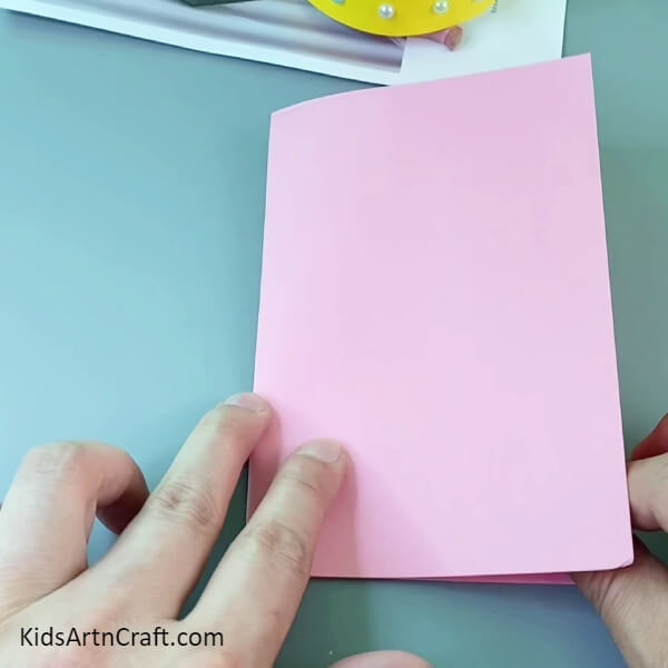 Folding Along The Crease- An activity idea for children is the paper crown